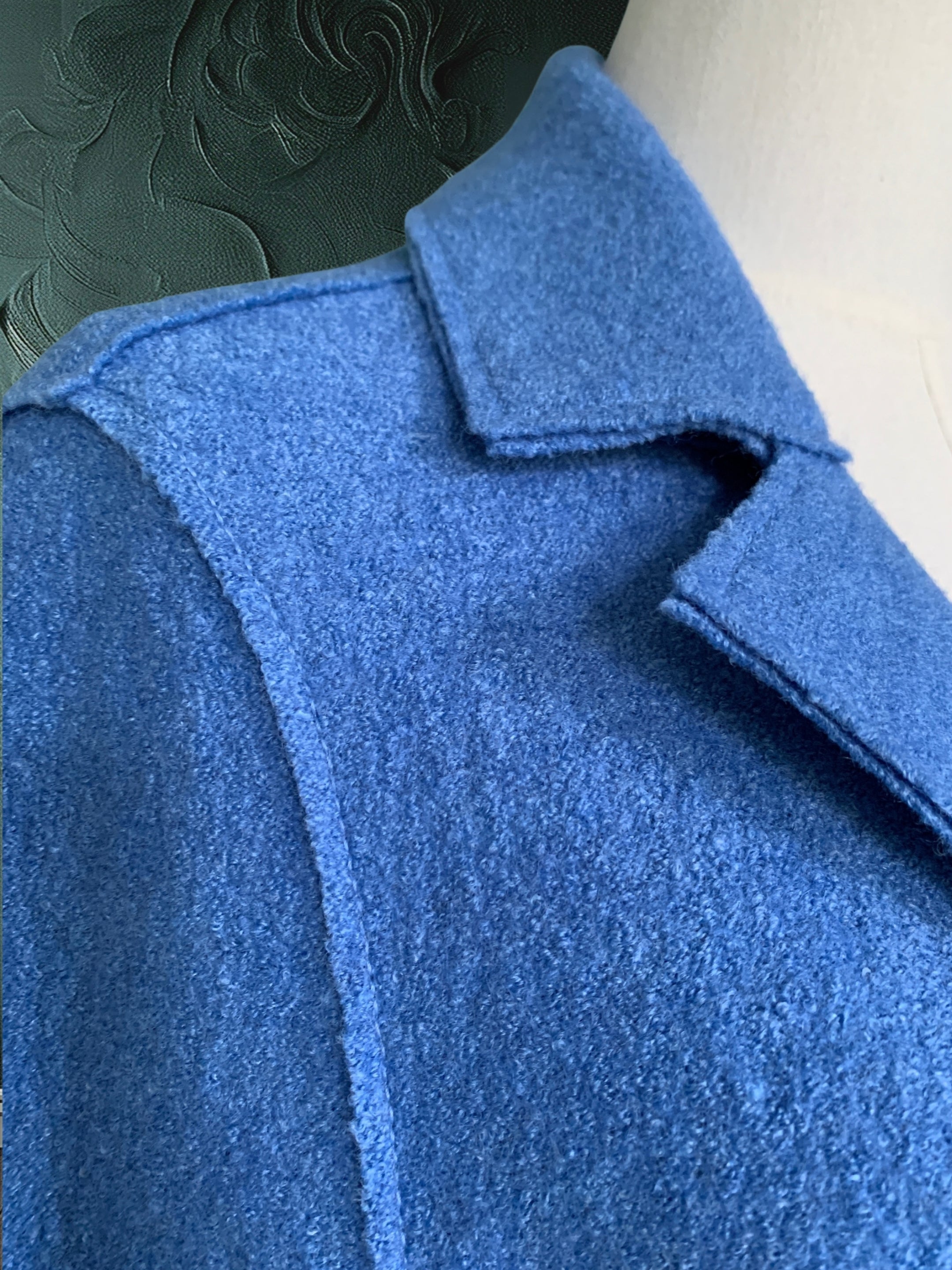 Vlněný blankytně modrý kabát